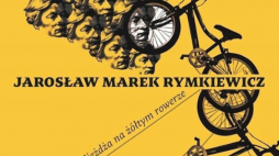 "Adam Mickiewicz odjeżdża na żółtym rowerze"