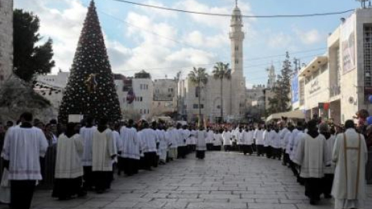 Procesja do Bazyliki Narodzenia Pańskiego w Betlejem. 2014.12.24. Fot. PAP/EPA