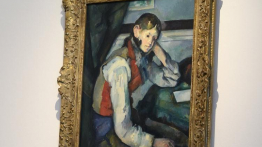"Chłopiec w czerwonej kamizelce" Cezanne'a na wystawie arcydzieł impresjonistów z kolekcji sztuki Emila Buehrlego w Fundacji Hermitage w Lozannie. Fot. PAP/EPA