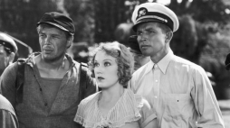 Jedna ze scen filmu „King Kong” z 1933 r.: widoczni m.in. Fay Wray jako Ann Darrow i Bruce Cabot Bruce Cabot jako John „Jack” Driscoll (1. z prawej). Fot. NAC