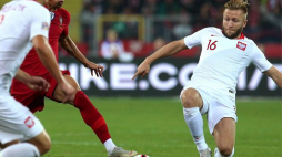 Jakub Błaszczykowski (P) i Joao Cancelo (2L) podczas meczu piłkarskiej Ligi Narodów Polska – Portugalia. Chorzów, 11.10.2018. Fot. PAP/A. Grygiel