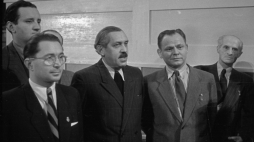 Warszawa, 1948-12-20. Kongres Zjednoczeniowy Polskiej Partii Robotniczej (PPR) i Polskiej Partii Socjalistycznej (PPS), 15-21 XII, w auli Politechniki Warszawskiej. I Zjazd Polskiej Zjednoczonej Partii Robotniczej (PZPR). Szósty dzień Kongresu. Nz. od lewej: Stanisław Dygat, Leopold Lewin, Aleksander Wat, Stanisław Ryszard Dobrowolski i Julian Tuwim. Fot. PAP/CAF