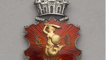Odznaka członka Warszawskiej Straży Obywatelskiej w 1915 r. Fot. Muzeum Warszawa