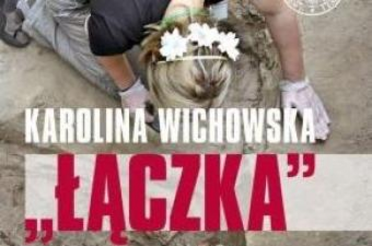 Fragent okładki książki K. Wichowskiej "Łączka".