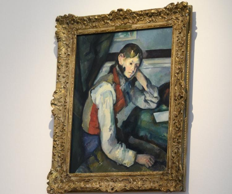 "Chłopiec w czerwonej kamizelce" Cezanne'a na wystawie arcydzieł impresjonistów z kolekcji sztuki Emila Buehrlego w Fundacji Hermitage w Lozannie. Fot. PAP/EPA
