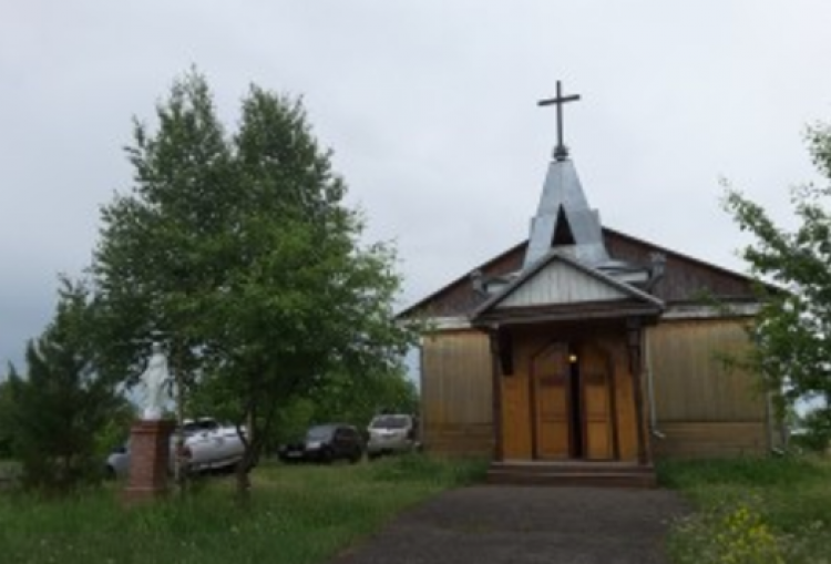 Kościół w Białymstoku na Syberii przed pożarem. Źródło: www.belostok-catholic.ru