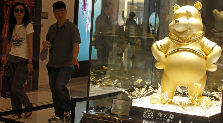 Figura Kubusia Puchatka na wystawie w Hong Kongu. Fot. PAP/EPA/Alex Hofford